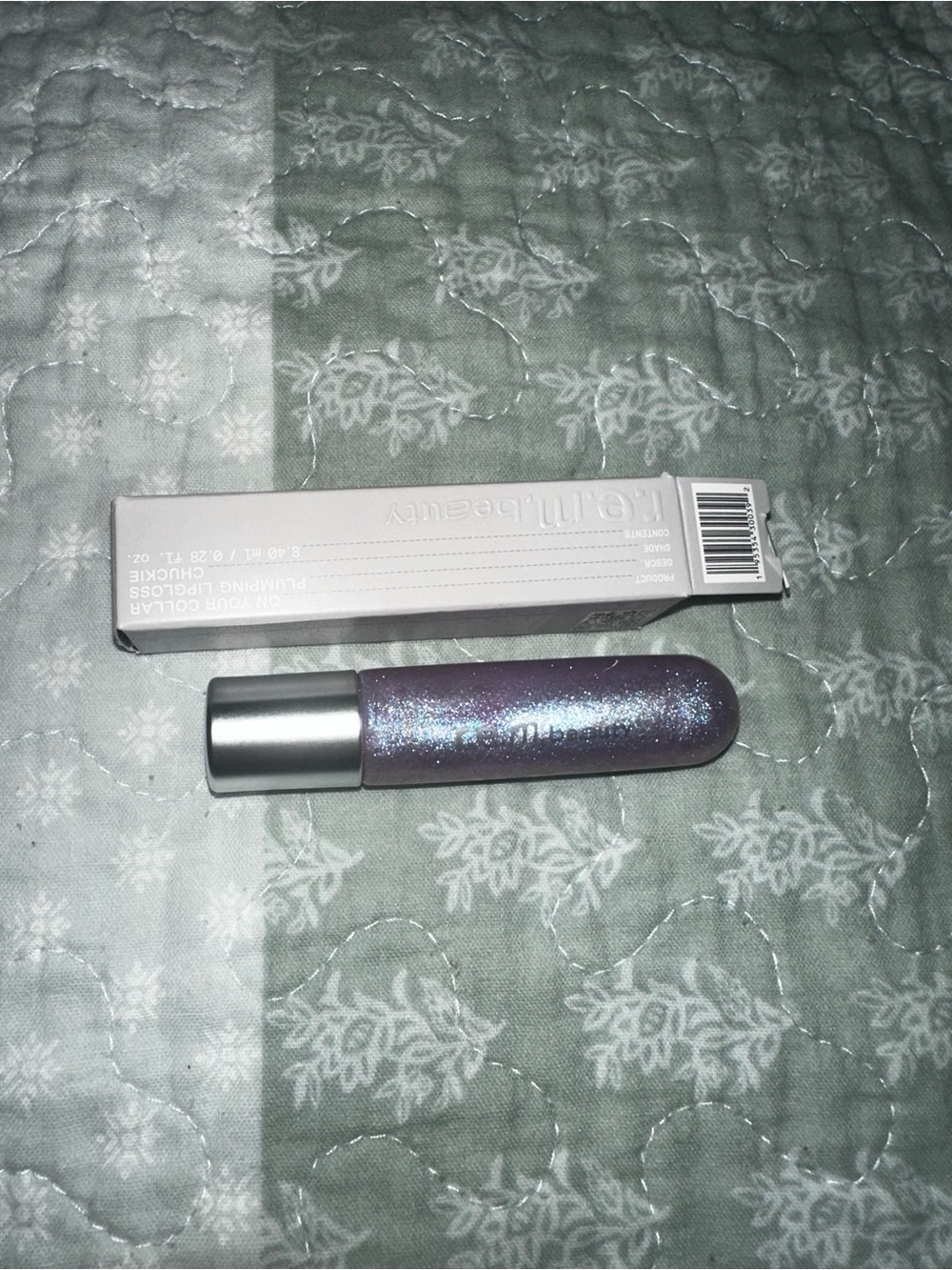 r.e.m. beauty On Your Collar Plumping Lipgloss Chuckie